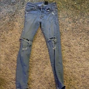 Blue ripped skinny jeans
